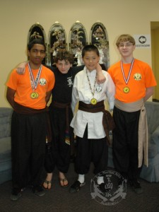 U.S. Martial Arts Academy, Ltd. students - volunteers and medal winners at Grandmaster Huang