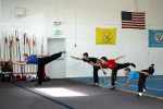 Eagle Team practice Stretch Kicks at US Martial Arts Academy, Ltd in Timonium, Maryland, www.usmaltd.com, 410-561-9882. ©2015 Maricar Jakubowski All rights reserved. No usage allowed in any form without the written consent of the photographer.