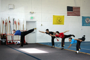 Eagle Team practice Stretch Kicks at US Martial Arts Academy, Ltd in Timonium, Maryland, www.usmaltd.com, 410-561-9882. ©2015 Maricar Jakubowski All rights reserved. No usage allowed in any form without the written consent of the photographer.