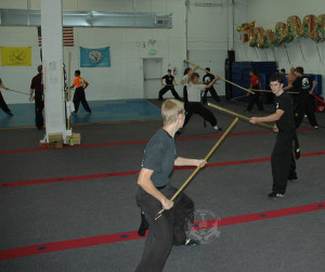 Long weapon techniques in the Black Sash Kung Fu Class at US Martial Arts Academy, Ltd in Timonium, Maryland 21093 www.usmaltd.com, 410-561-9882. ©2015 Maricar Jakubowski All rights reserved. No usage allowed in any form without the written consent of the photographer.