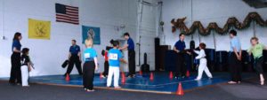 Kung Fu Kids Class for students 4-7yrs -- Self-Defense training improving coordination, concentration, memory, flexibility, strength, and balance. ©2015 Maricar Jakubowski All rights reserved.
