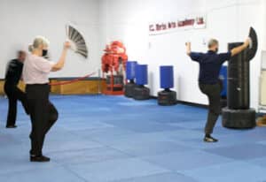 Practicing Fan Form in the Adult Tai Chi Advanced at U.S. Martial Arts Academy, Ltd. in Cockeysville, Md. 21030 Learning self-defense through Tai Chi & improving balance, strength, focus, agility, circulation, and many other health benefits.