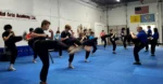 Family Kung Fu Kicking Drills-Learning Self-defense & improving focus, fitness, strength, self-discipline, balance, confidence, and memory thru Kung Fu in Cockeysville Maryland 21030 usmaltd.com; 410-561-9882