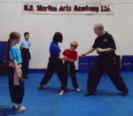 Family Kung Fu Chin-Na Skills-- Self-defense & improving focus, fitness, strength, self-discipline, balance, confidence, and memory thru Kung Fu in Cockeysville Md 21030 usmaltd.com; 410-561-9882